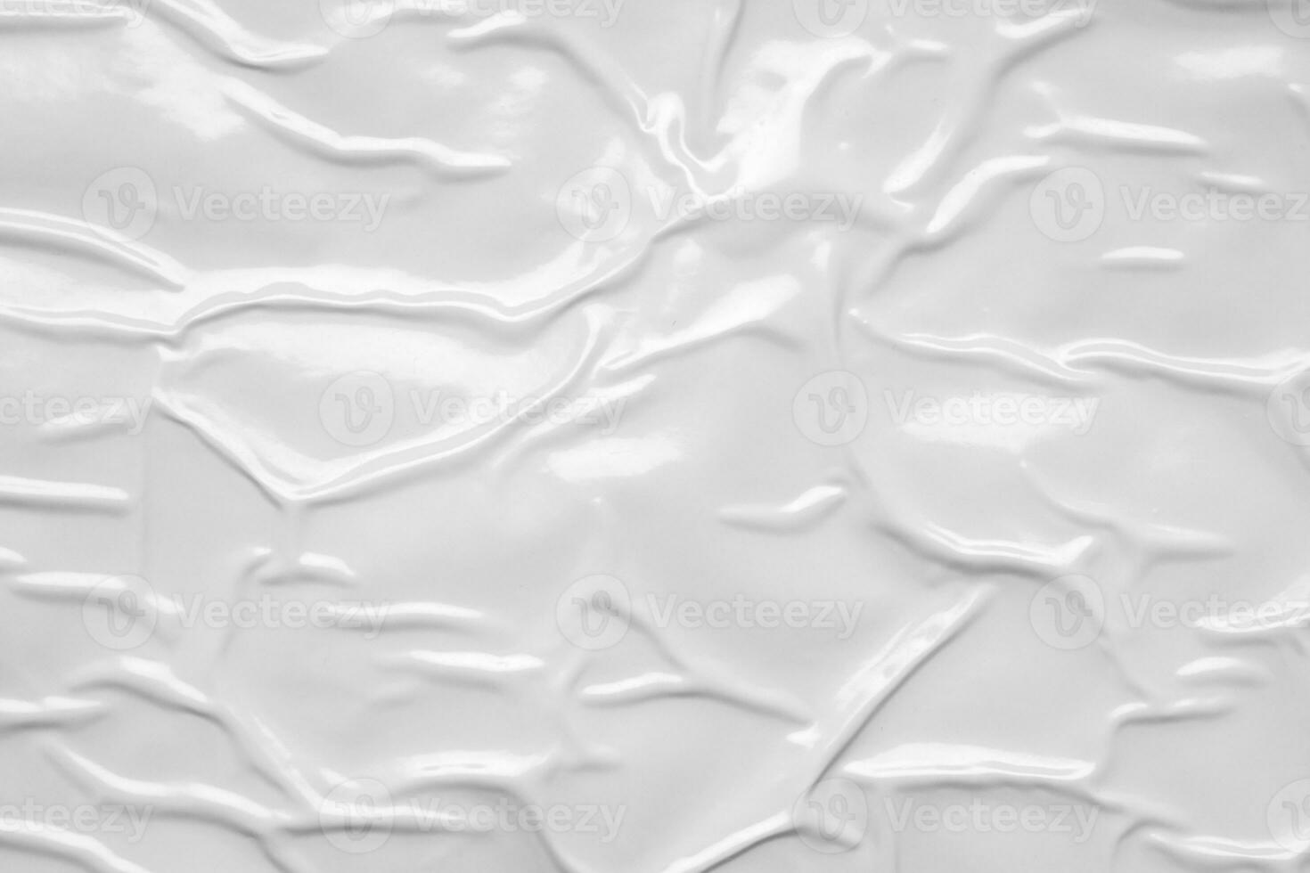 white crumpled and creased plastic bag texture background photo