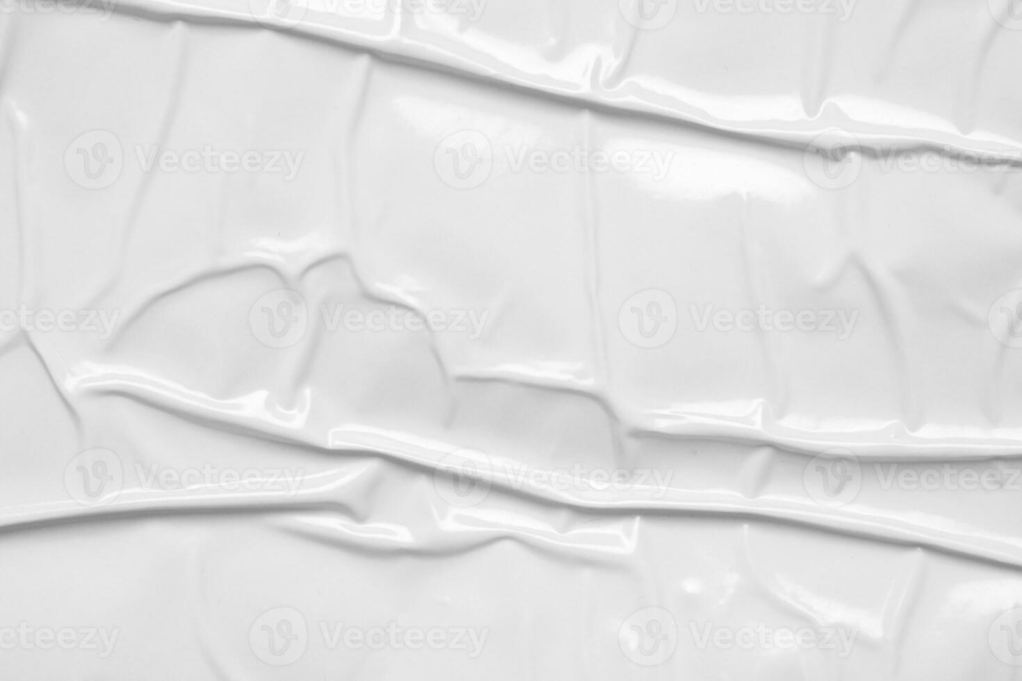 white crumpled and creased plastic bag texture background photo