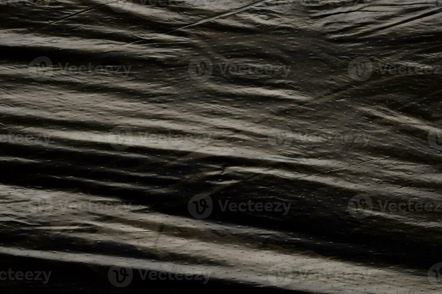 Black plastic bag texture background photo