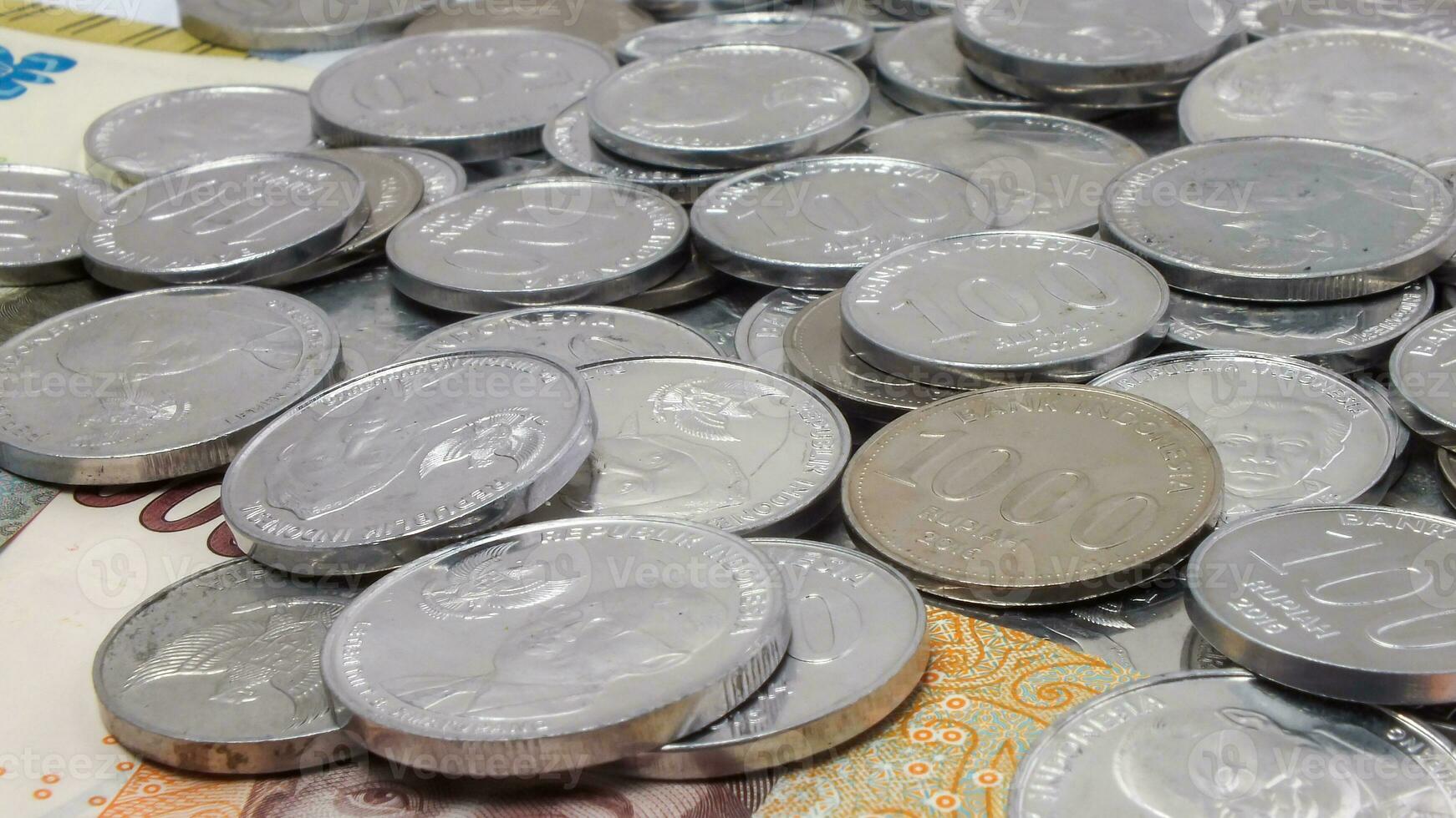 collection of Indonesian rupiah banknotes on a white background photo