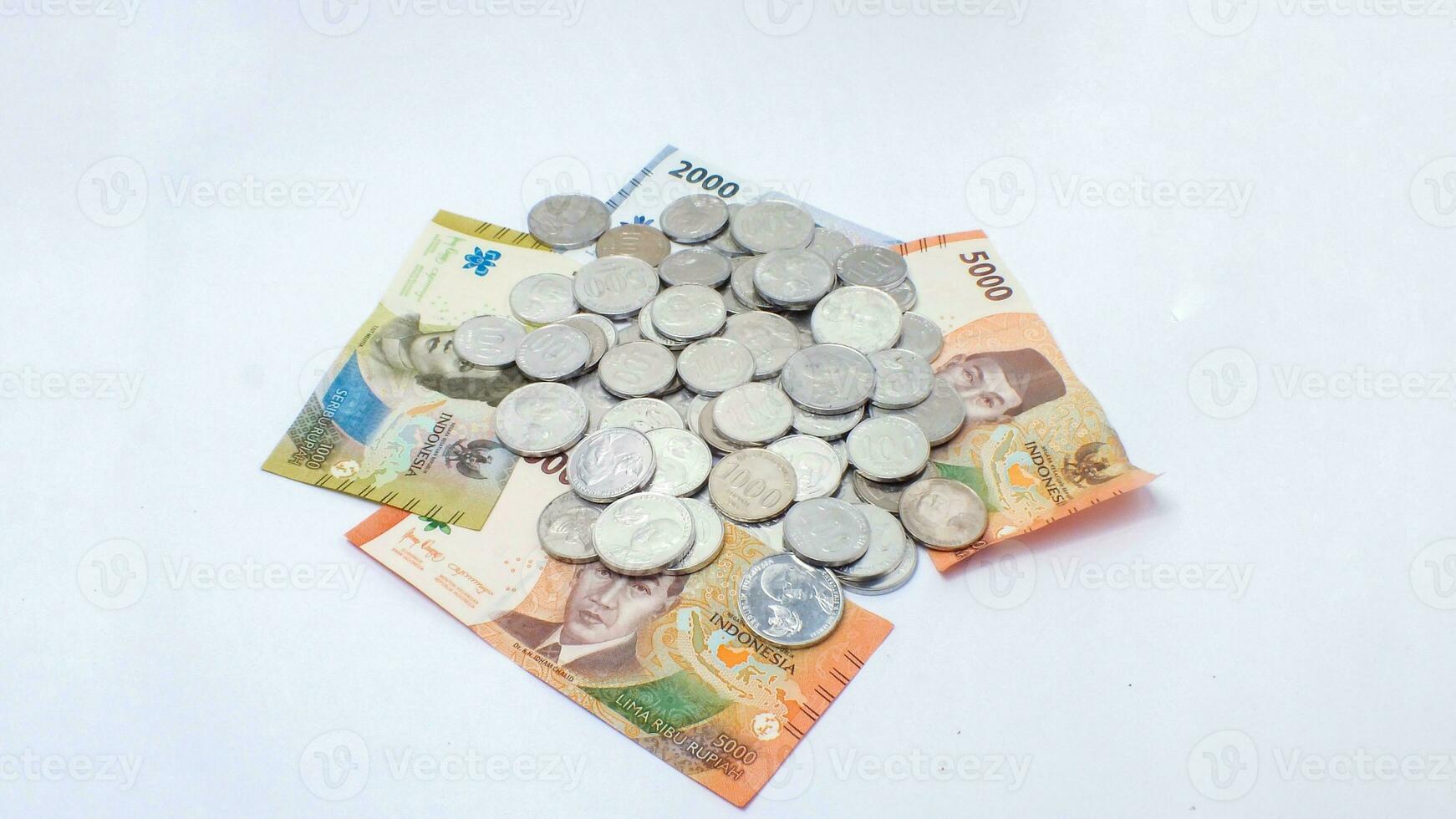 collection of Indonesian rupiah banknotes on a white background photo