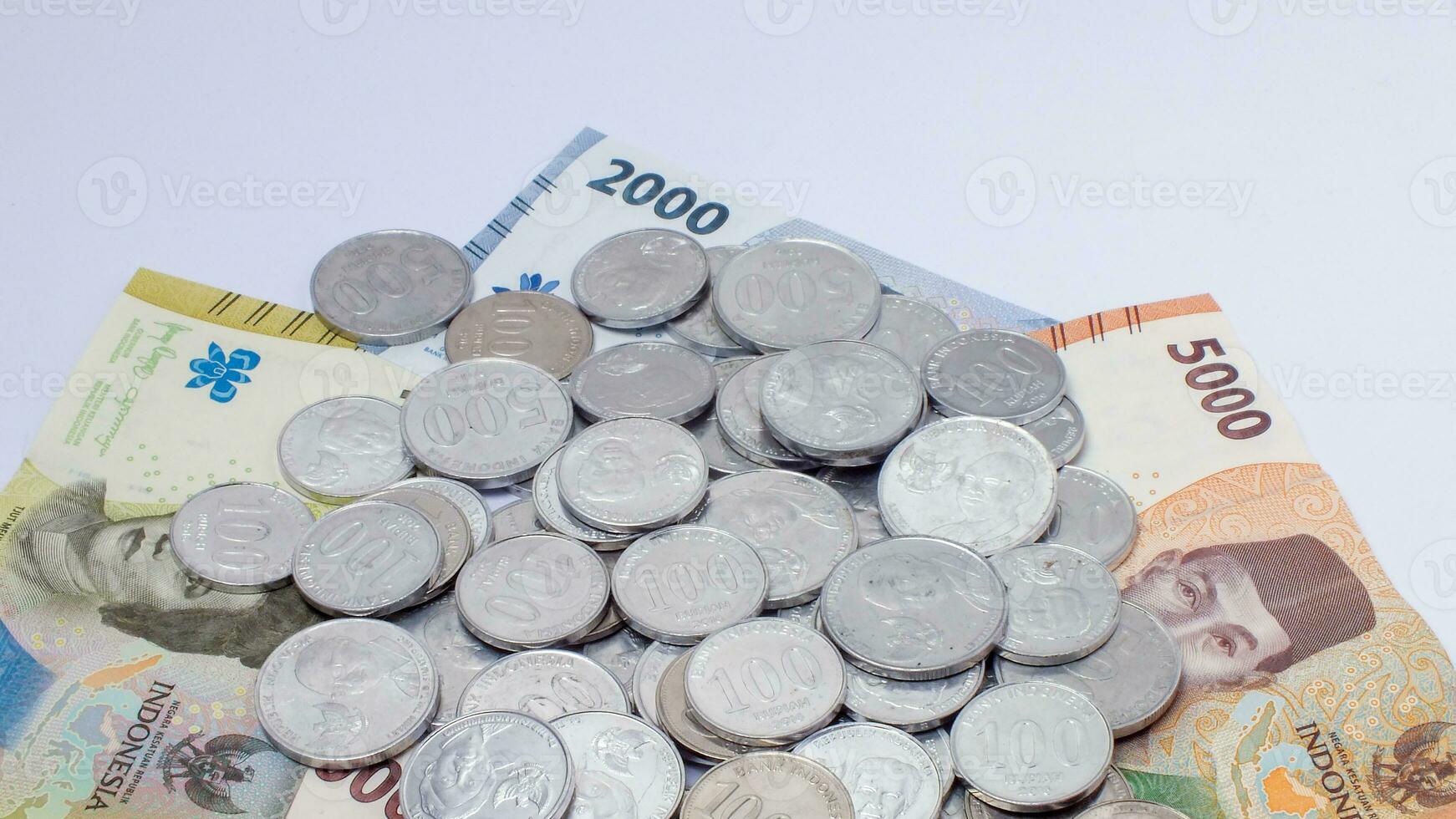 collection of Indonesian rupiah banknotes on a white background photo