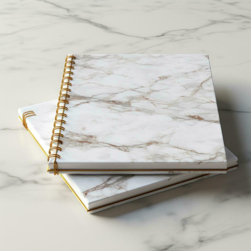 white and square notebook on a marble background photo