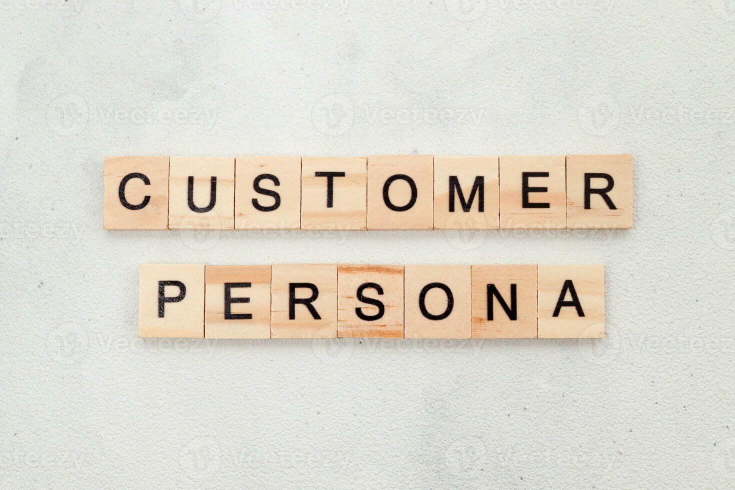 Top view of Customer Persona word on wooden cube letter block on white background. Business concept photo