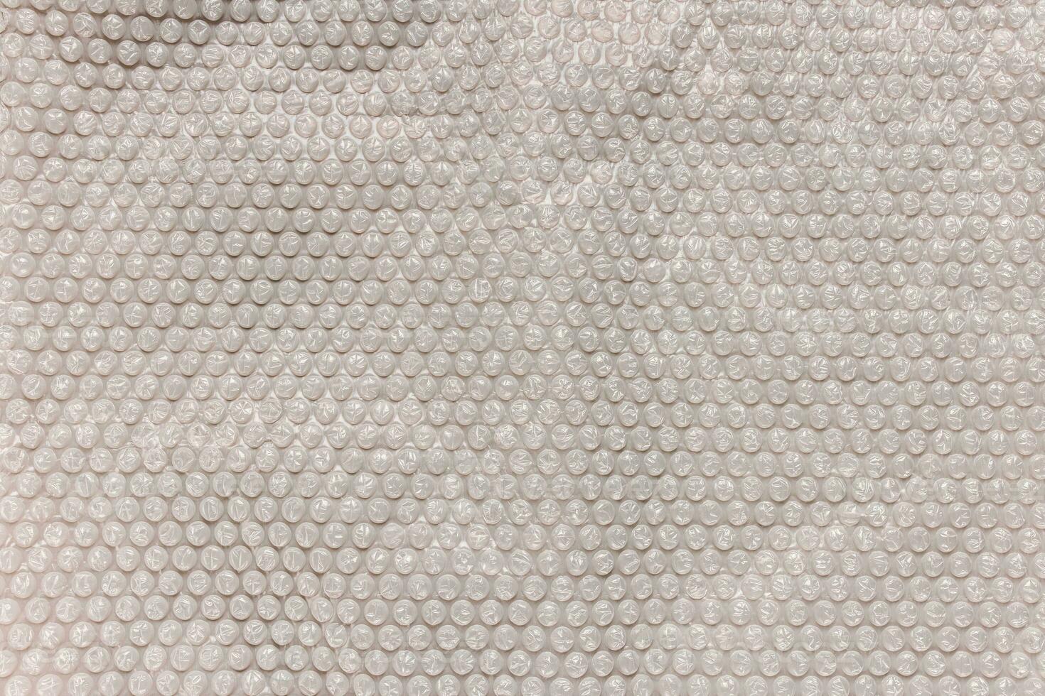 Beige bubble foil for wrapping, texture background photo