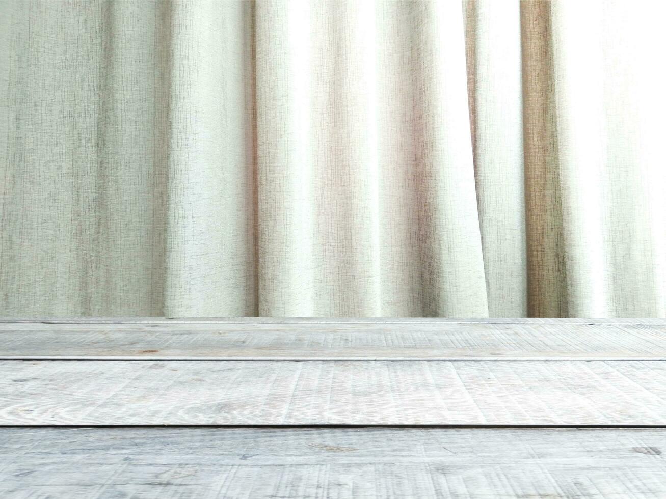 Wooden table, gray curtain backdrop  Empty space for displaying your products photo