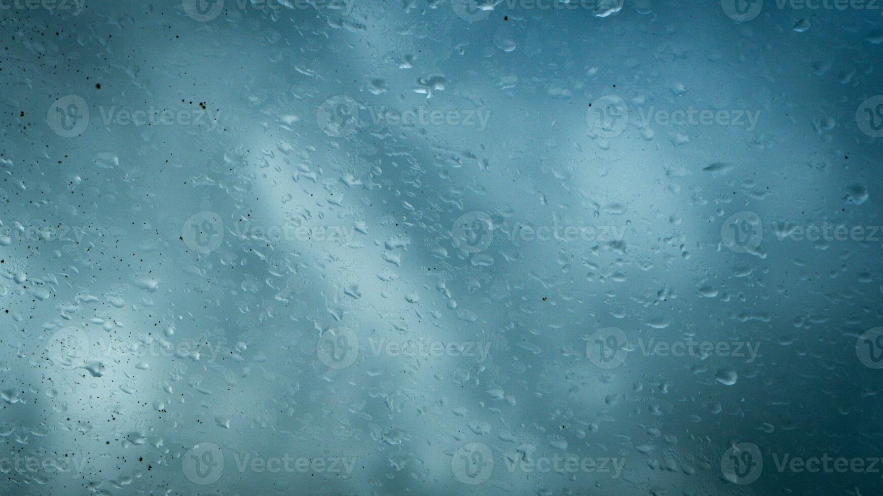 rain water drops on glass photo