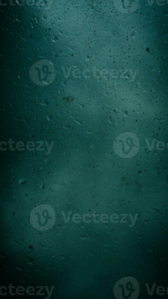lluvia agua gotas en vaso foto