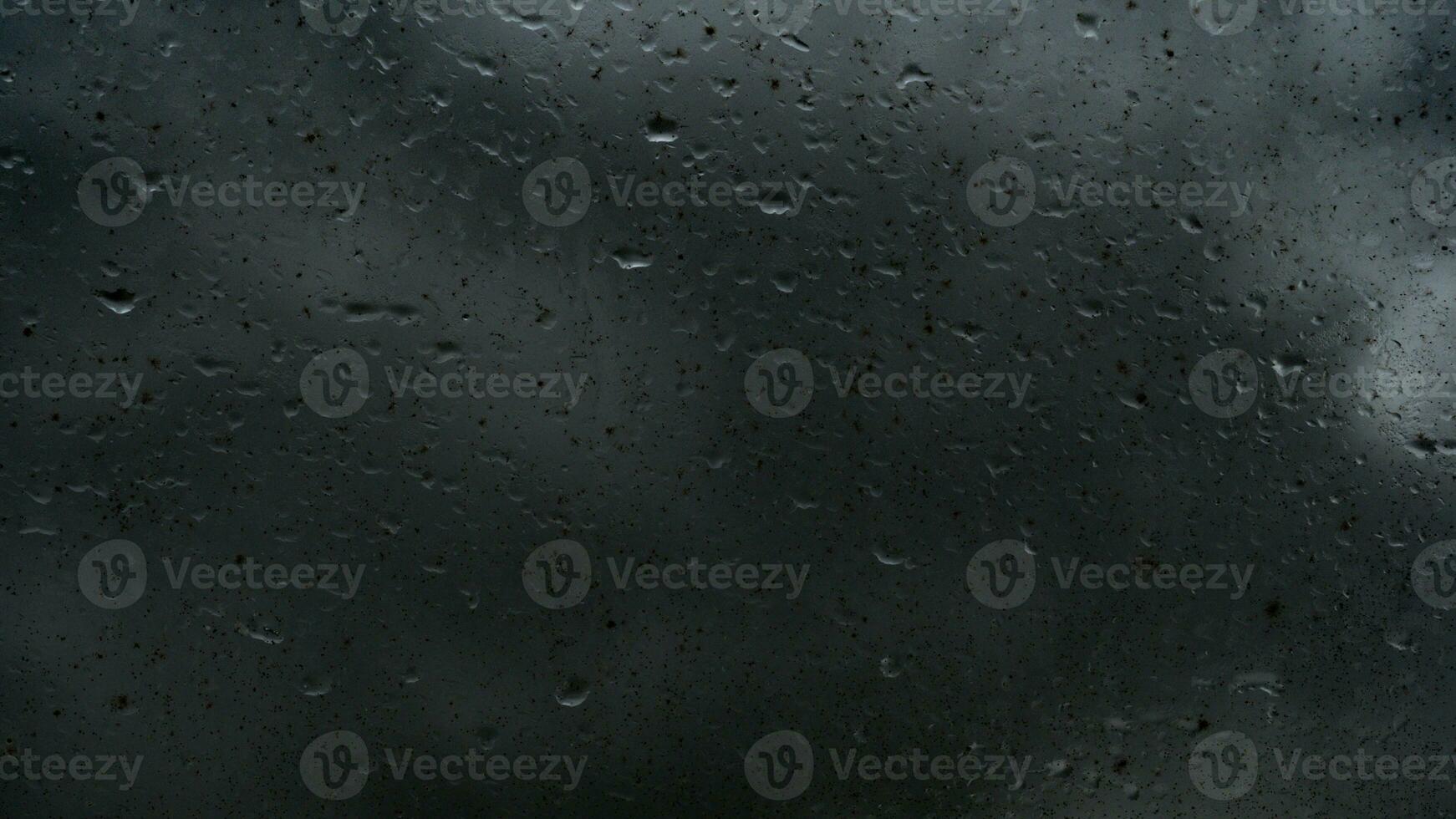rain water drops on glass photo