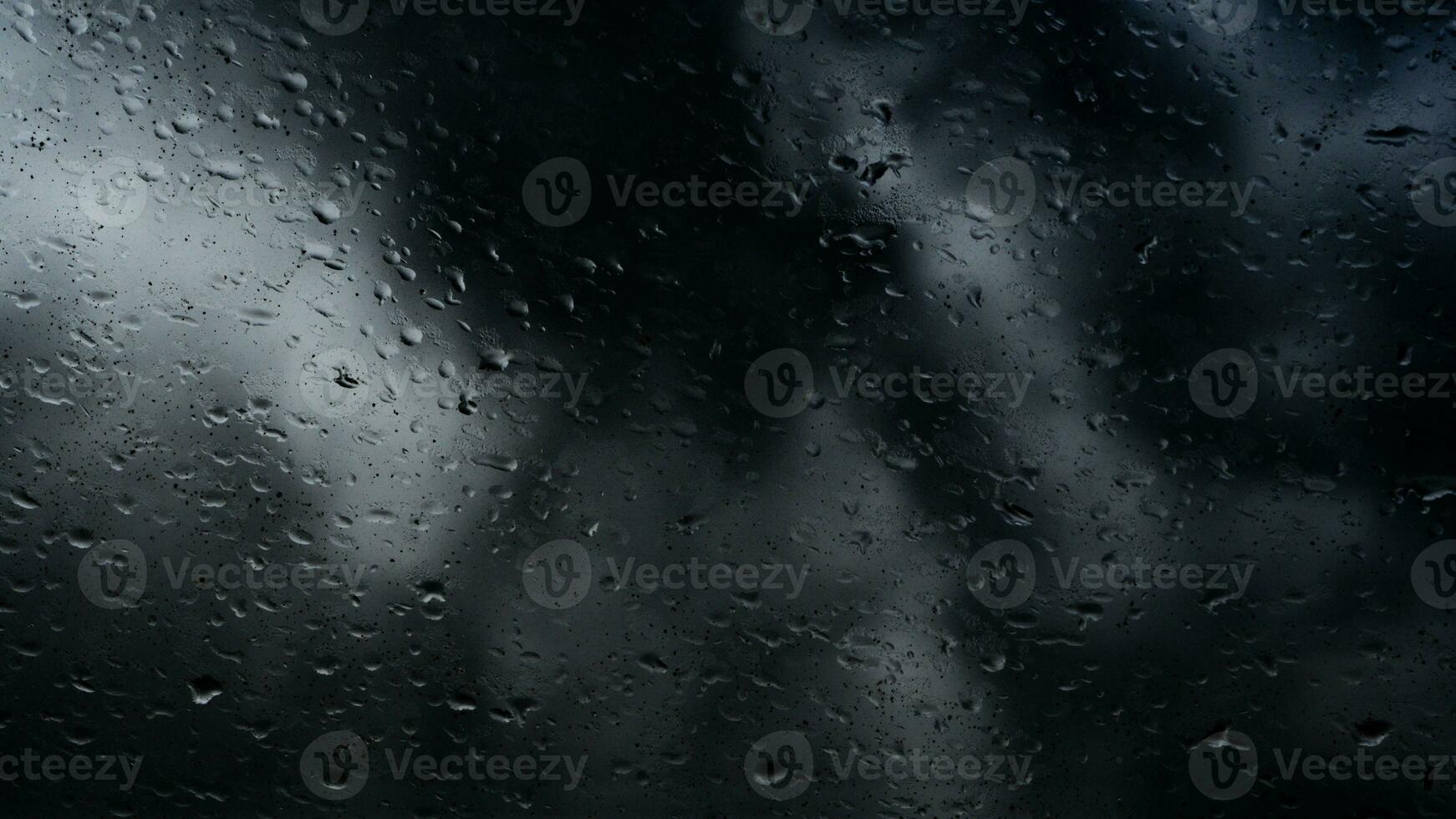 rain water drops on glass photo