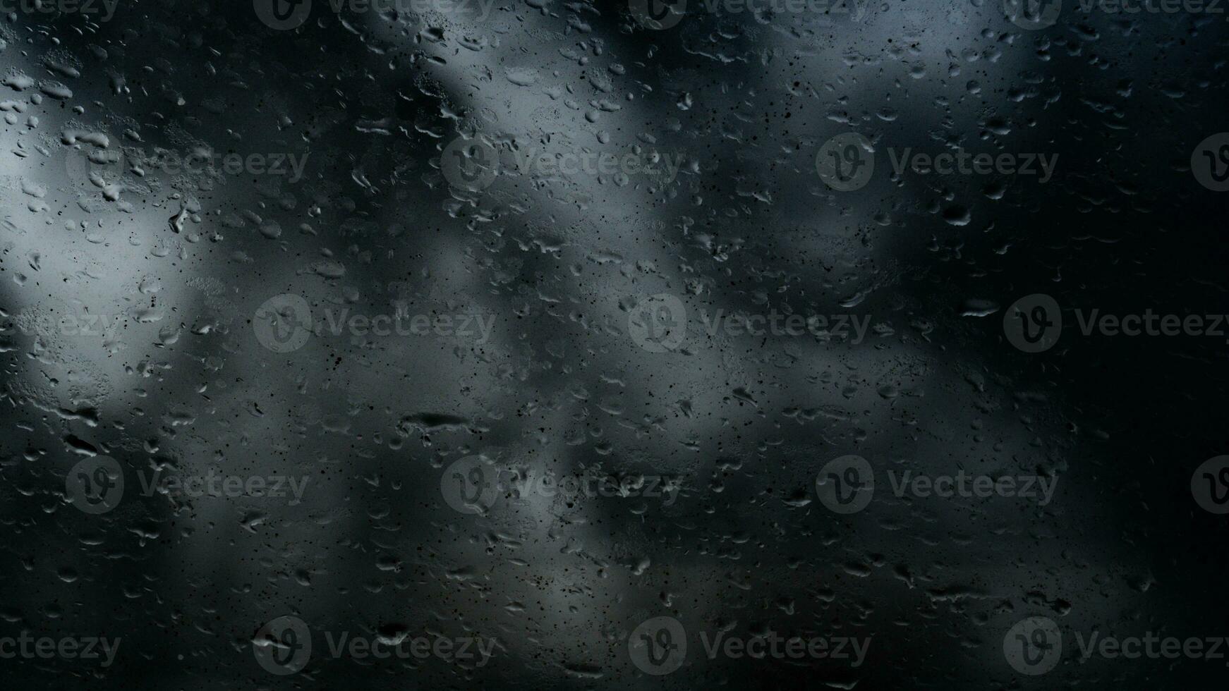 rain water drops on glass photo