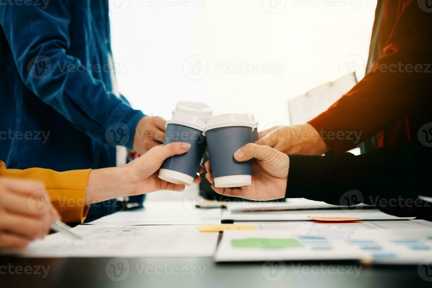 UX developer and ui designer brainstorming about mobile app interface wireframe design with customer breif and color code at modern office. photo