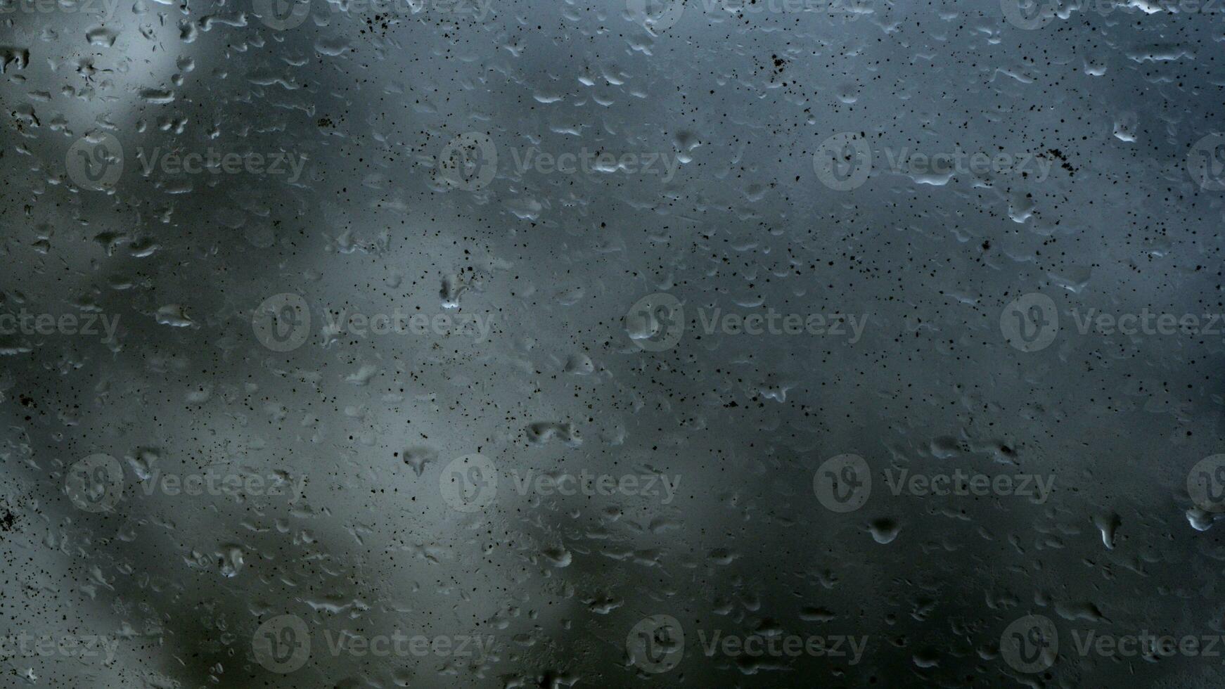 rain water drops on glass photo