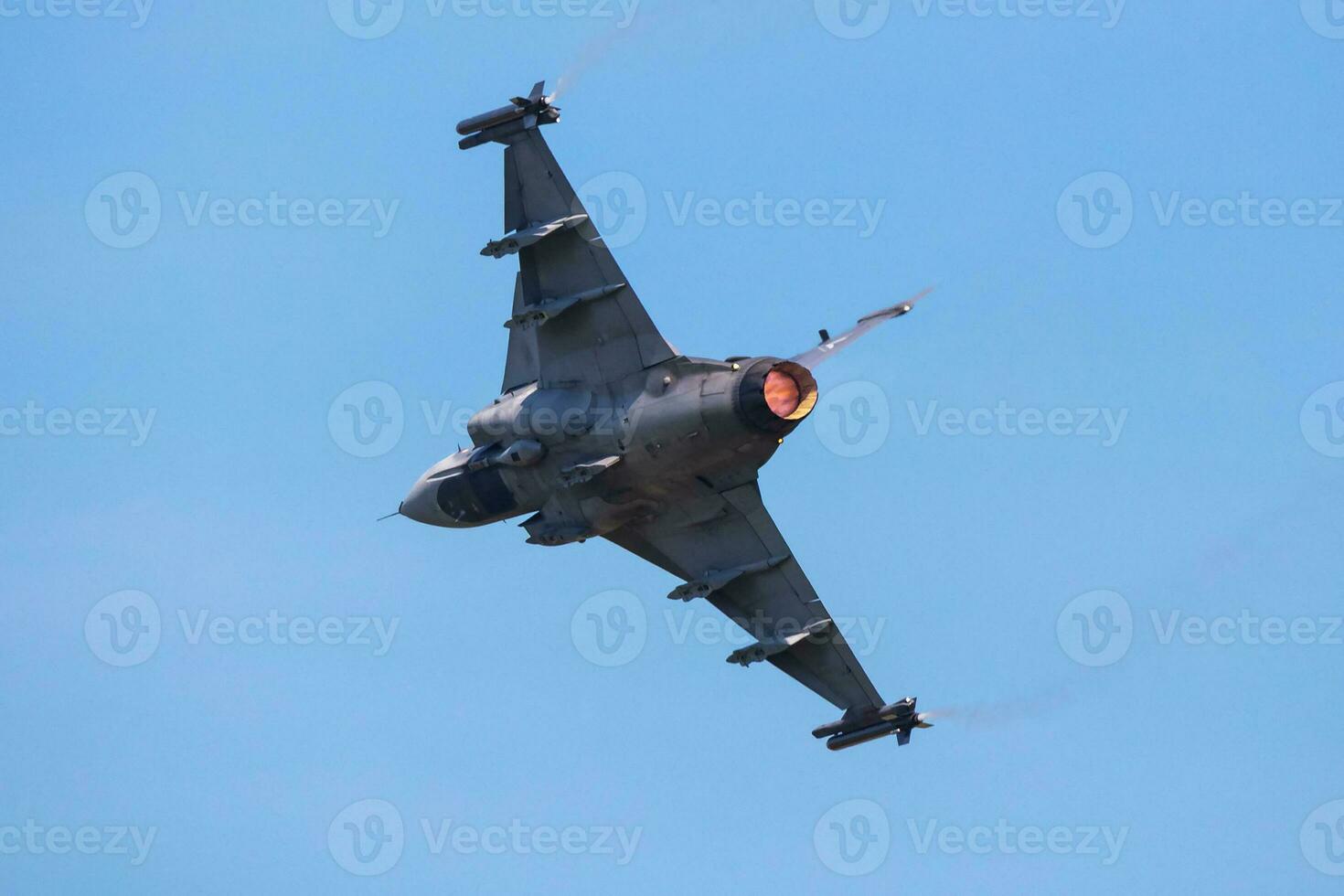 Military fighter jet plane at air base. Airport and airfield. Air force flight operation. Aviation and aircraft. Air defense. Military industry. Fly and flying. photo