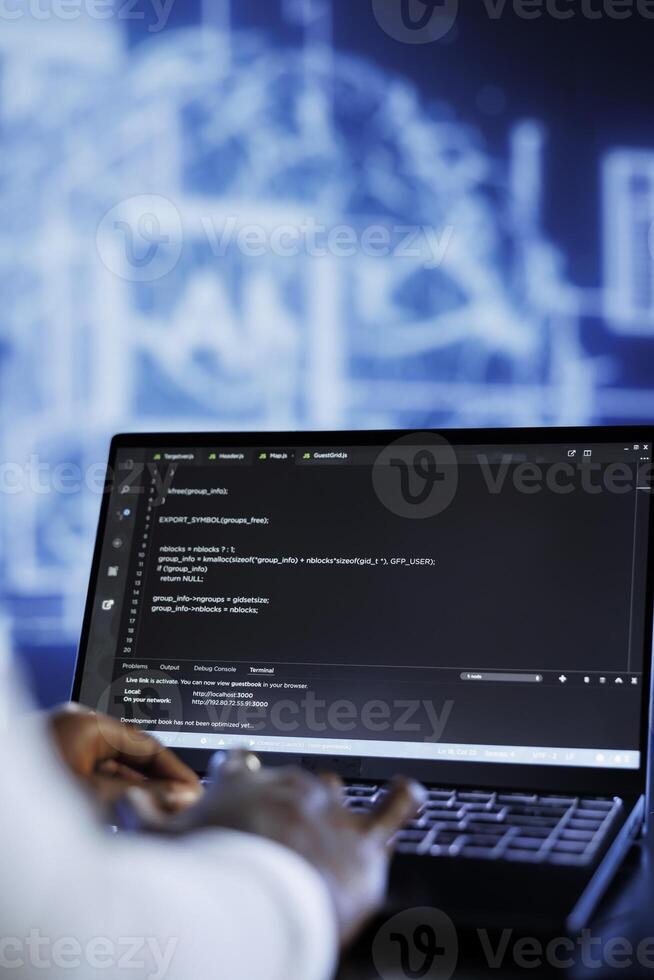 Licensed developer updates neural networks made up of interconnected nodes, writing intricate binary code scripts on laptop. Specialist uses programming to upgrade AI simulation model, close up photo