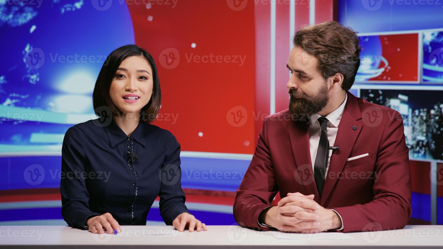 Diverse presenters hosting morning show to cover all news stories on global television network, international program. Man and woman journalists presenting media segment live on tv panel. photo