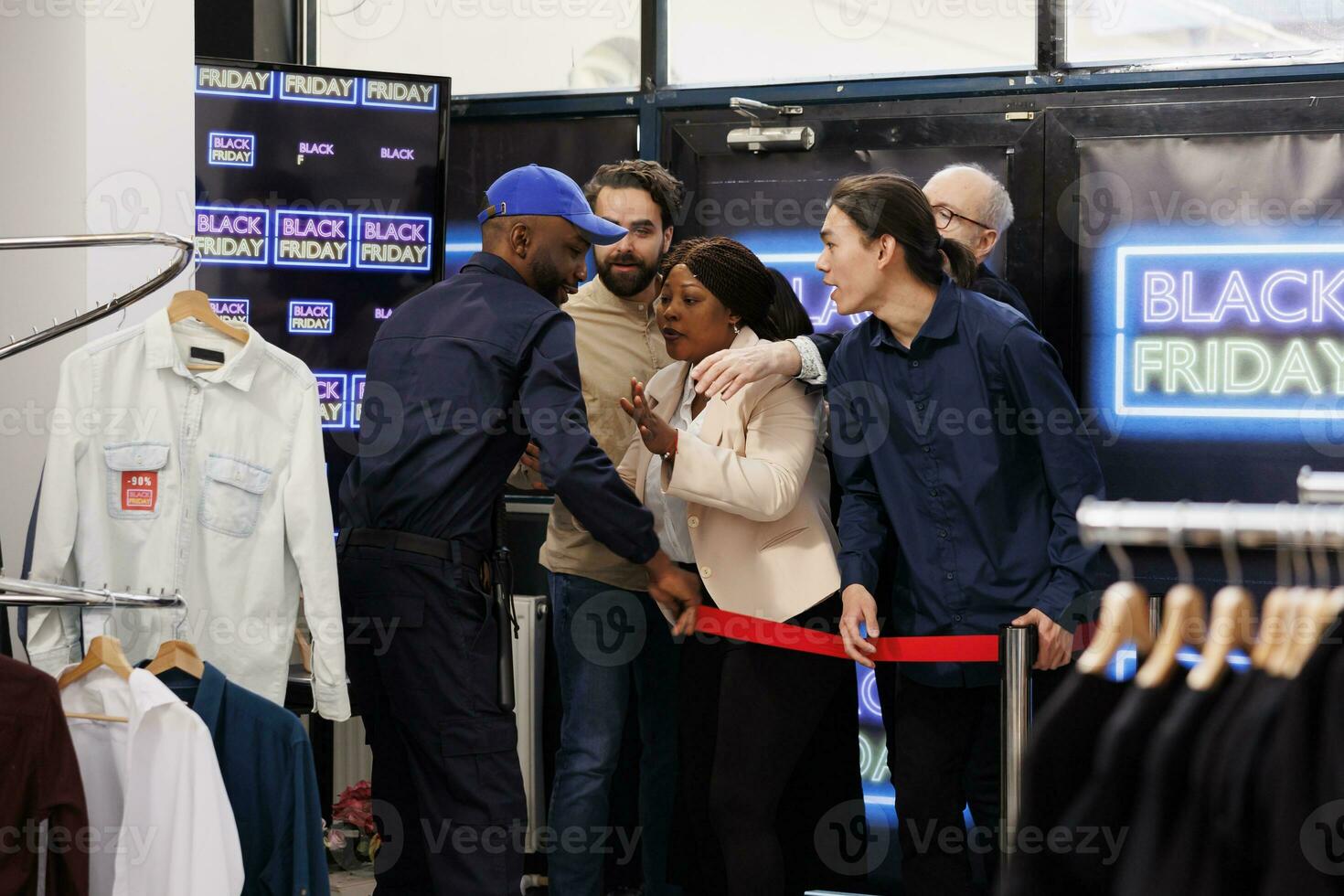 Retail fashion store opening doors for customers on Black Friday, shoppers starting holiday shopping. Diverse people buyers ready to get best deals during seasonal sales, entering clothing shop photo