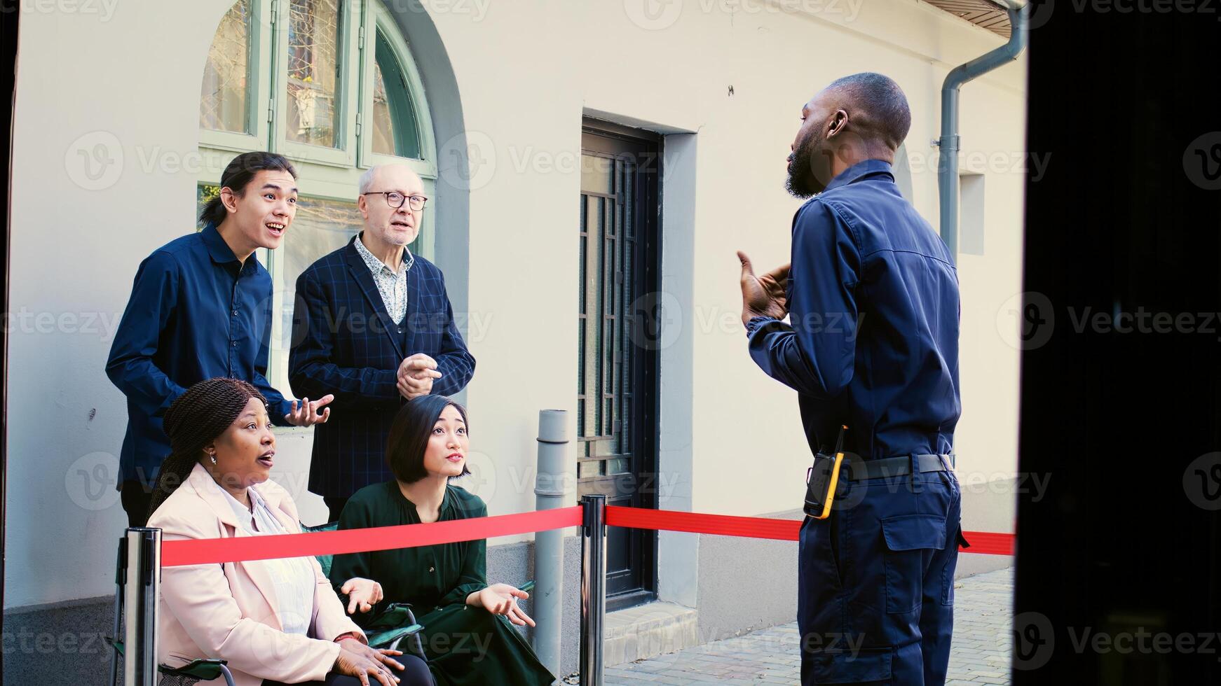 Tired mad customers lined up at store front door on black friday arguing with security agent. Diverse shoppers customers feeling anxious waiting outside of shopping center entrance. photo