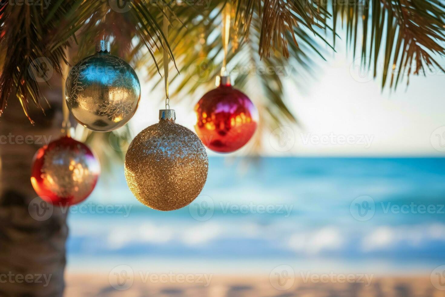 Christmas ornaments gleaming on palm trees along a serene tropical beach photo