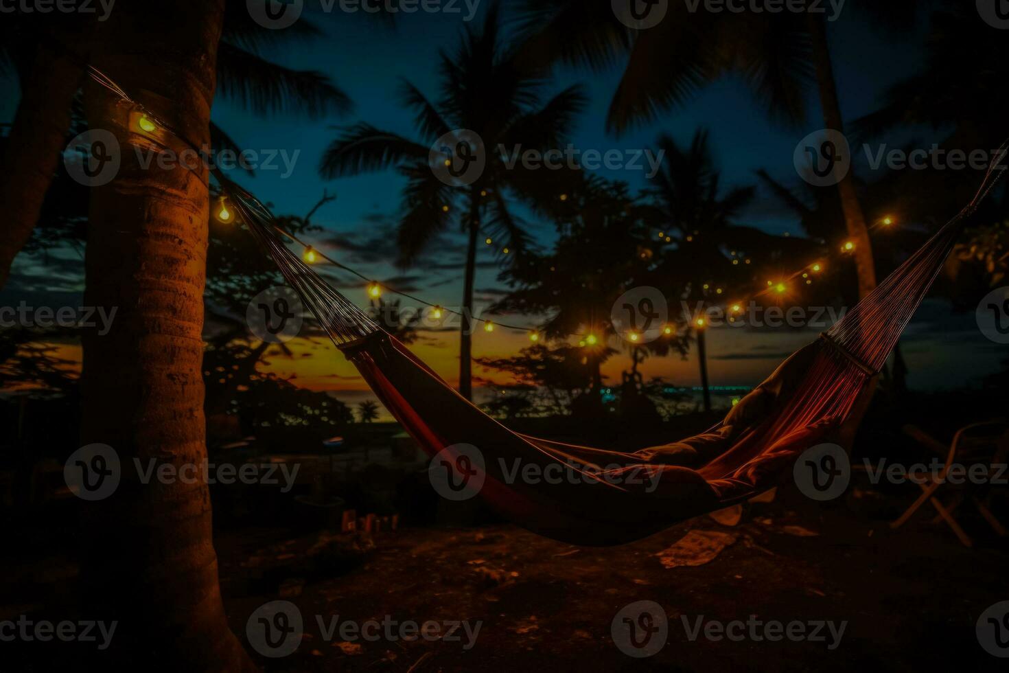 Star gazing in hammocks wrapped in warmth of New Years tropical night photo