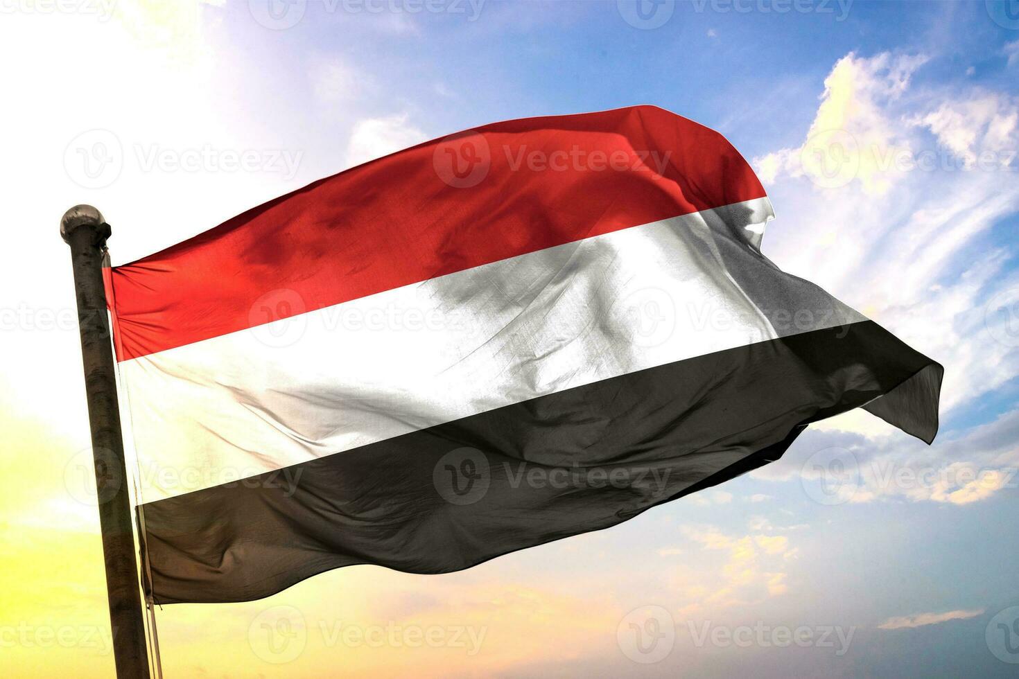 Yemen. 3D rendering flag waving isolated sky and cloud background photo