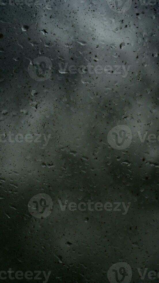 rain water drops on glass photo