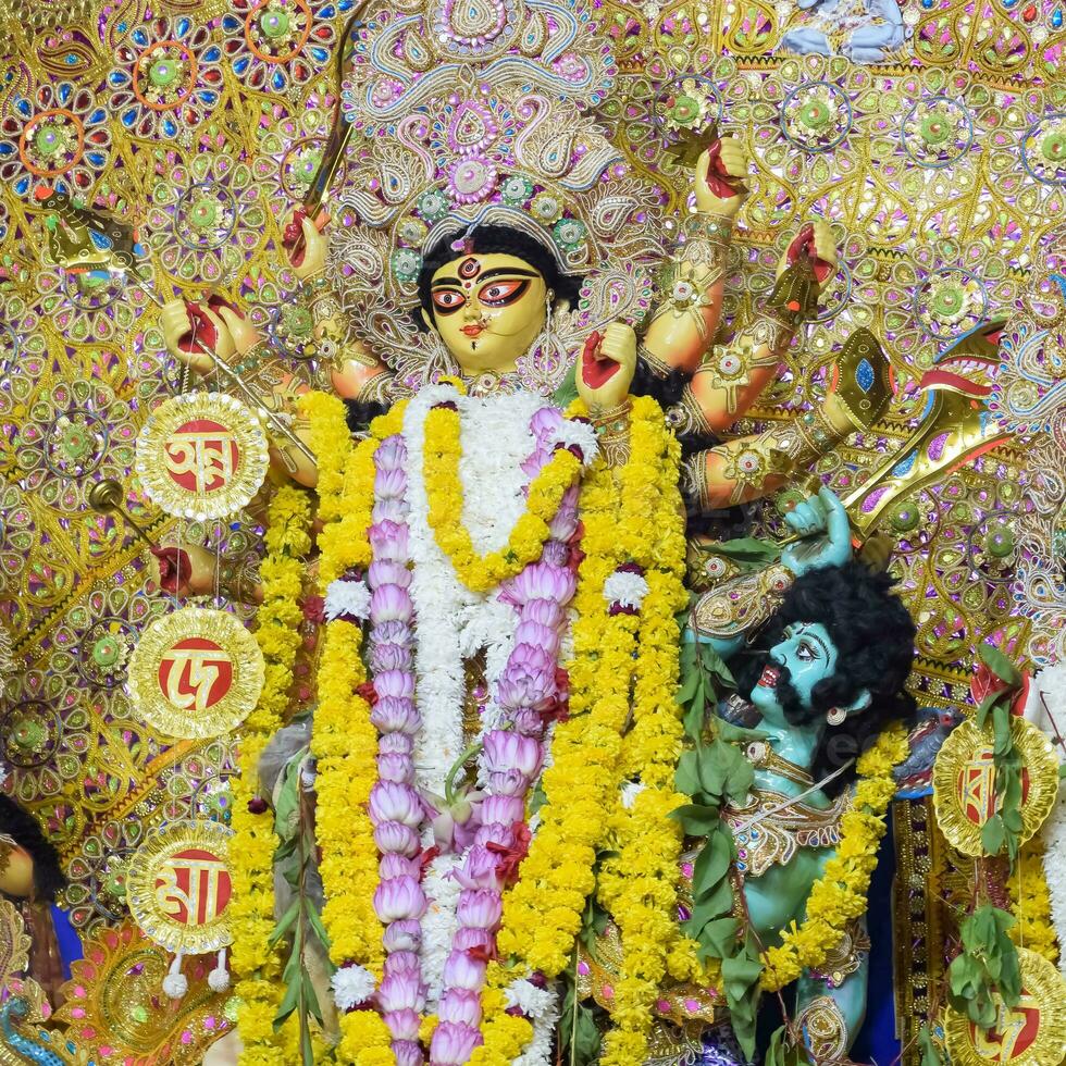 Goddess Durga with traditional look in close up view at a South Kolkata Durga Puja, Durga Puja Idol, A biggest Hindu Navratri festival in India photo