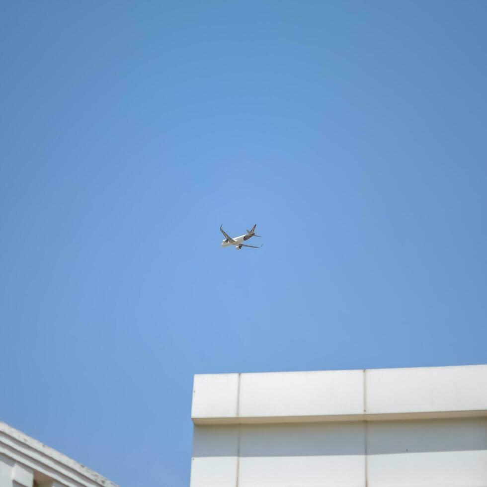 New Delhi, India, April 16 2023 - Vistara Airbus A320 neo take off from Indra Gandhi International Airport Delhi, Vistara domestic aeroplane flying in the blue sky during day time photo