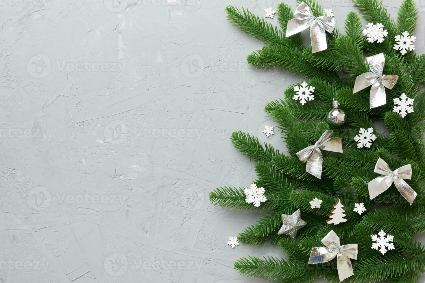 Christmas background with fir branches and Christmas decor. Top view, copy space for text photo