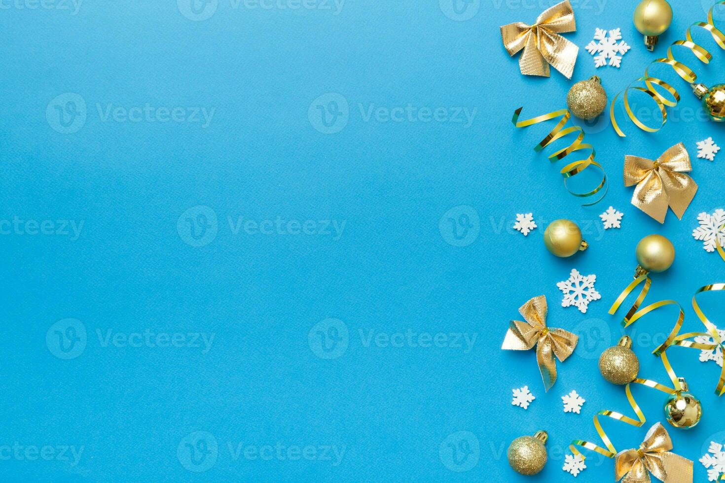 New Year composition white christmas snowflakes. Christmas decor background with pine cones. Top view with copy space photo
