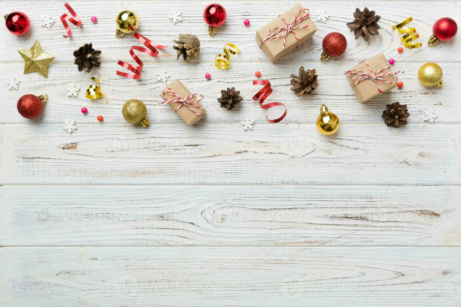 New Year composition. Christmas decor background with pine cones. Top view with copy space photo
