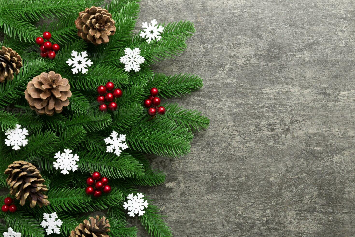 Christmas background with fir branches and Christmas decor. Top view, copy space for text photo