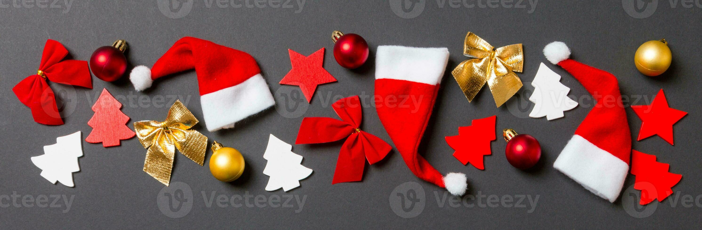 Top view Banner of black background with New Year toys and decorations. Christmas time concept with copy space photo