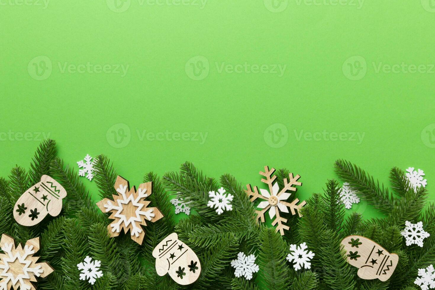 Christmas background with fir branches and Christmas decor. Top view, copy space for text photo
