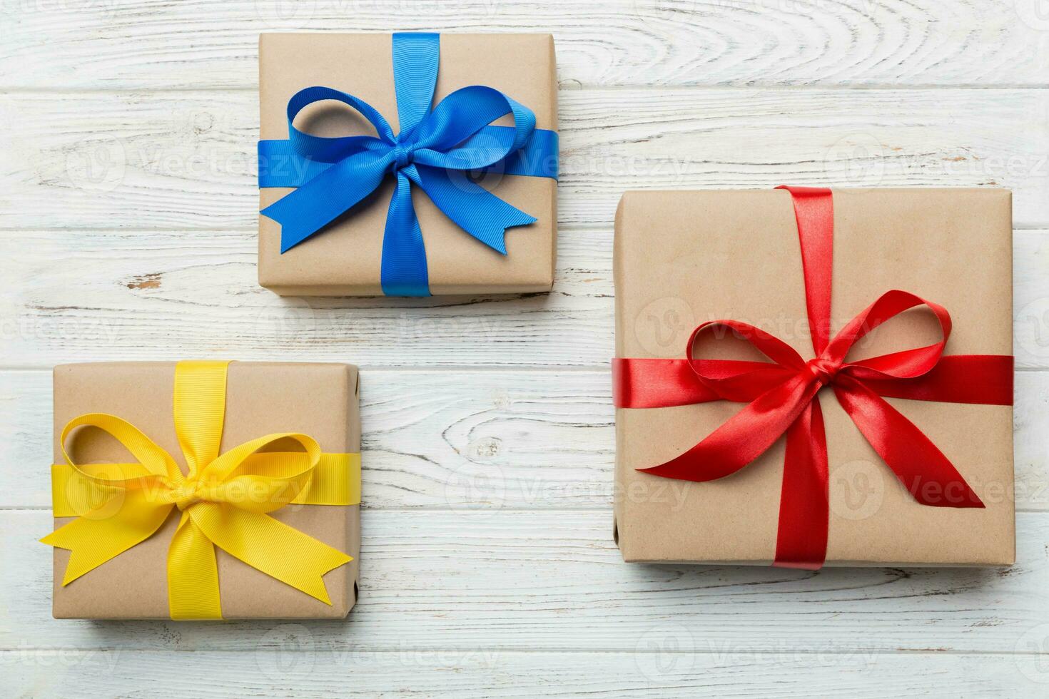 Collection of Holiday present boxes on a colored background. top view close up photo