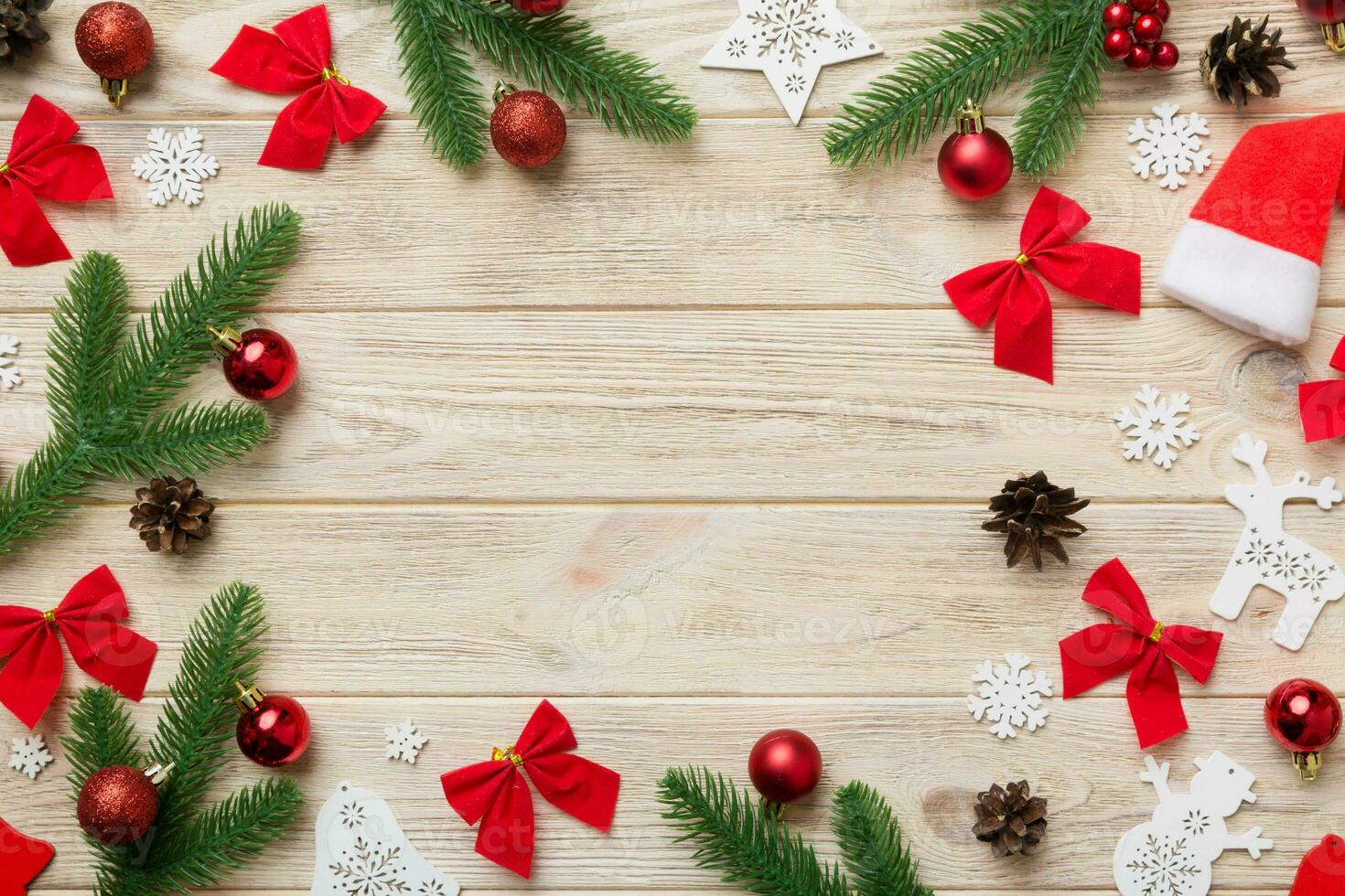 Christmas background with fir branches and Christmas decor. Top view, copy space for text photo