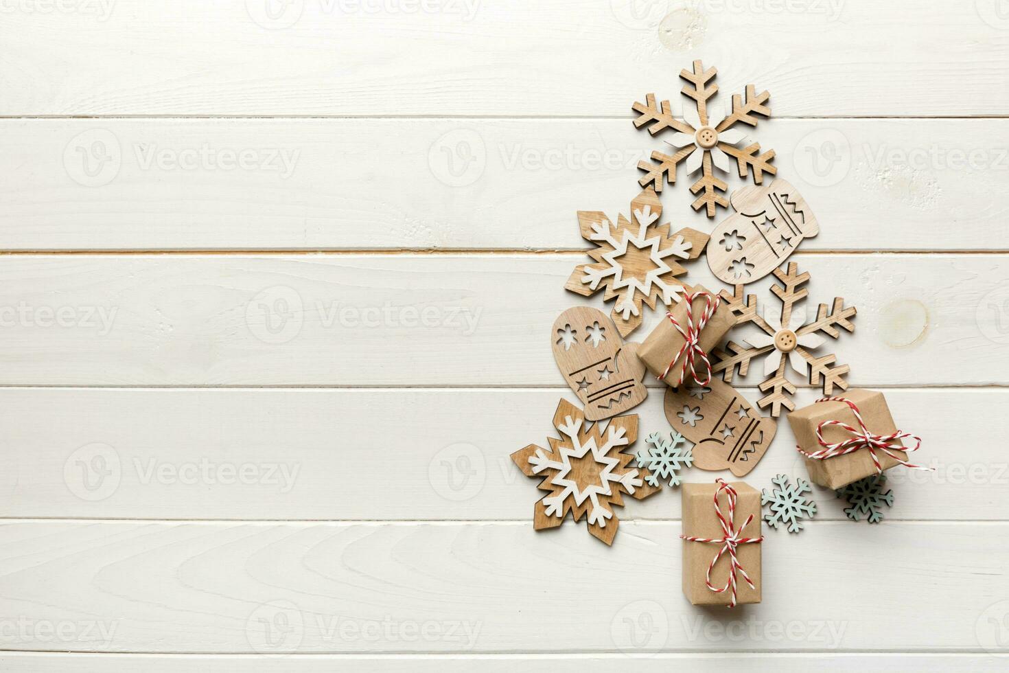 Christmas tree made from colored ball decoration on colored background, view from above. New Year minimal concept with copy space photo