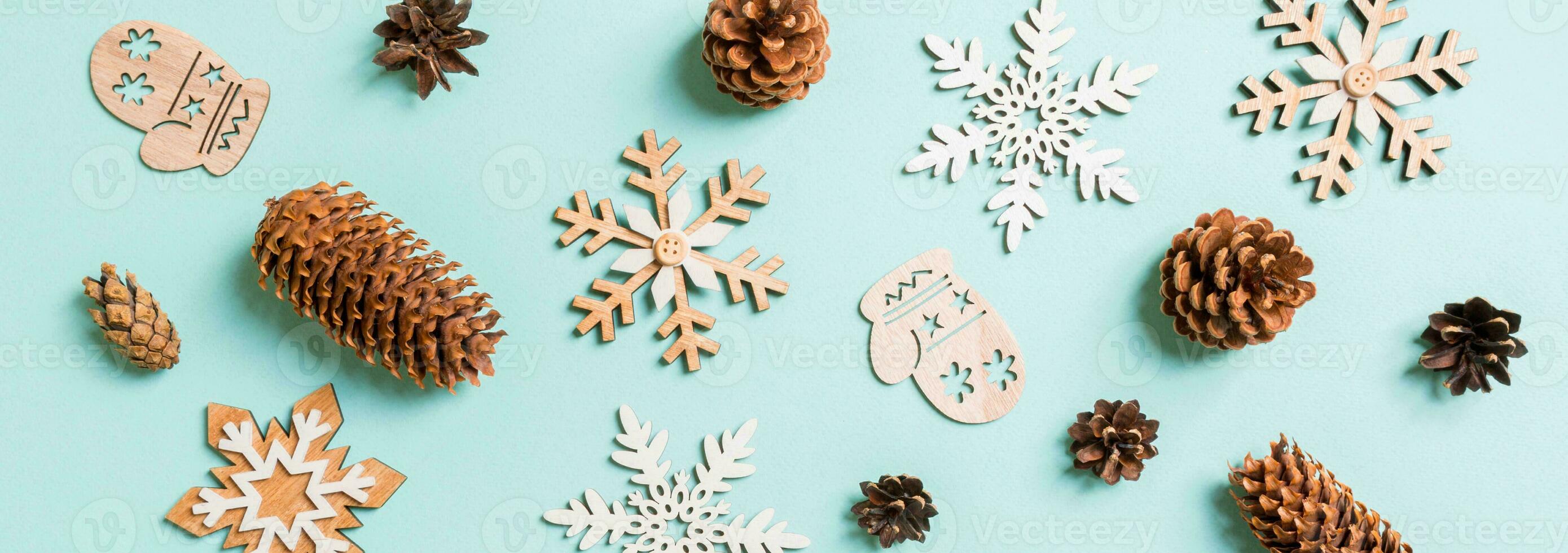 Top view Banner of holiday toys and decorations on blue Christmas background. New Year time concept photo