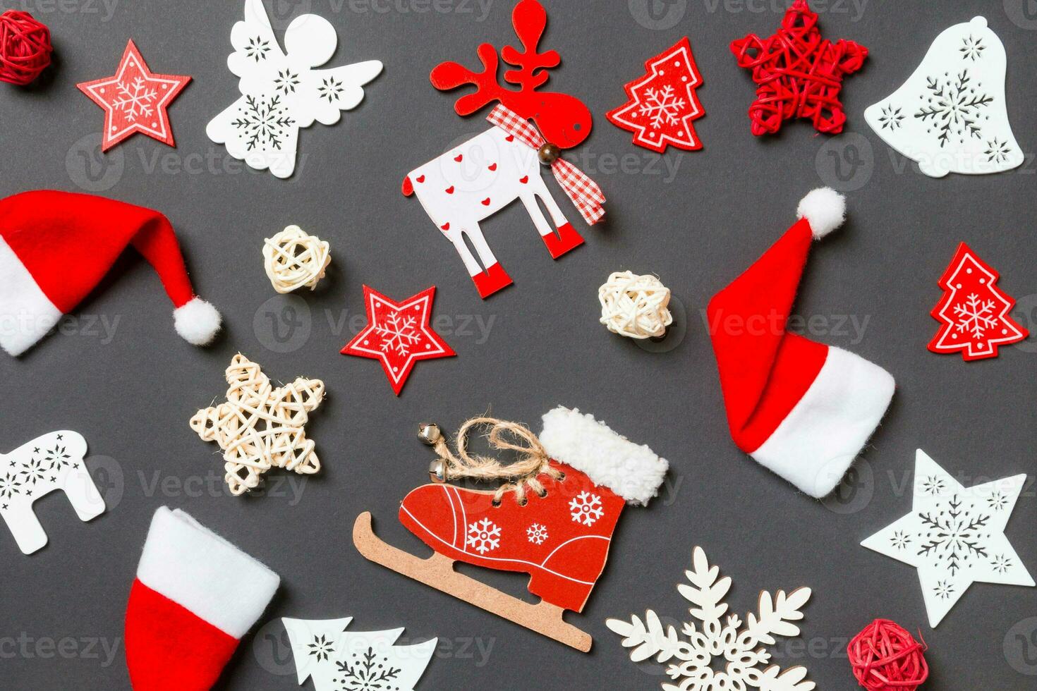 Top view of New Year decorations on black background. Merry Christmas concept photo