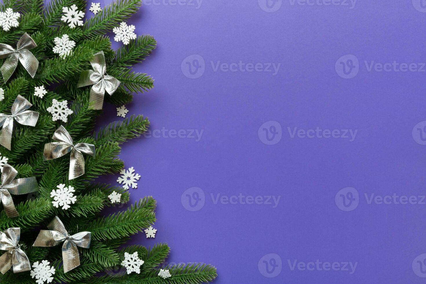 Christmas background with fir branches and Christmas decor. Top view, copy space for text photo