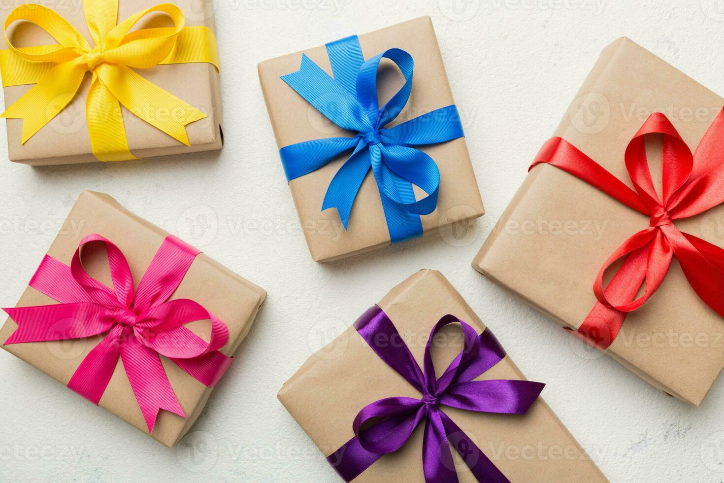Collection of Holiday present boxes on a colored background. top view close up photo