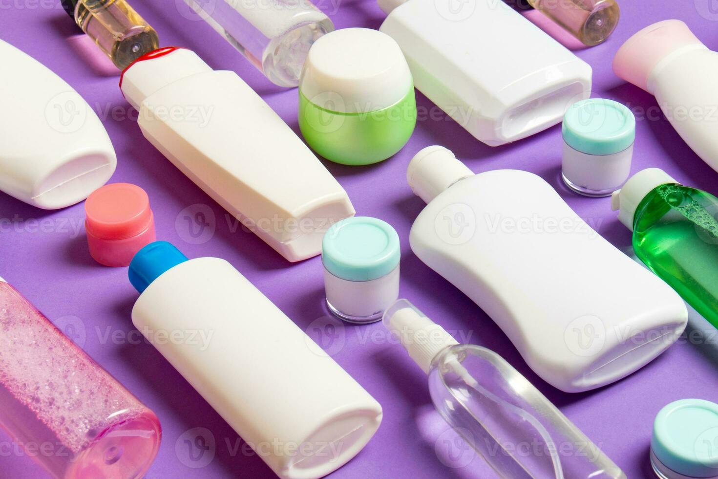 Group of plastic bodycare bottle Flat lay composition with cosmetic products on colored background empty space for you design. Set of White Cosmetic containers, top view with copy space photo