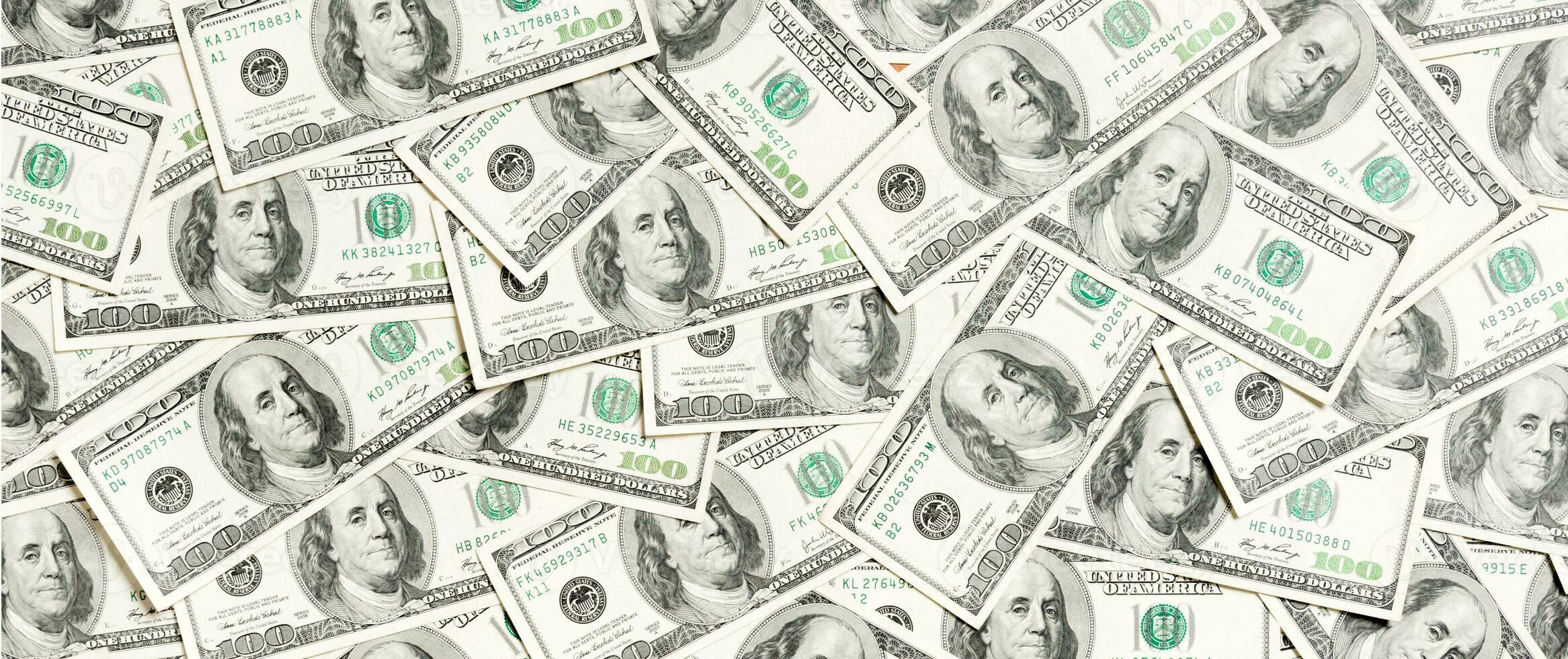 Top view of American money background. Pile of dollar cash. Paper banknotes concept photo
