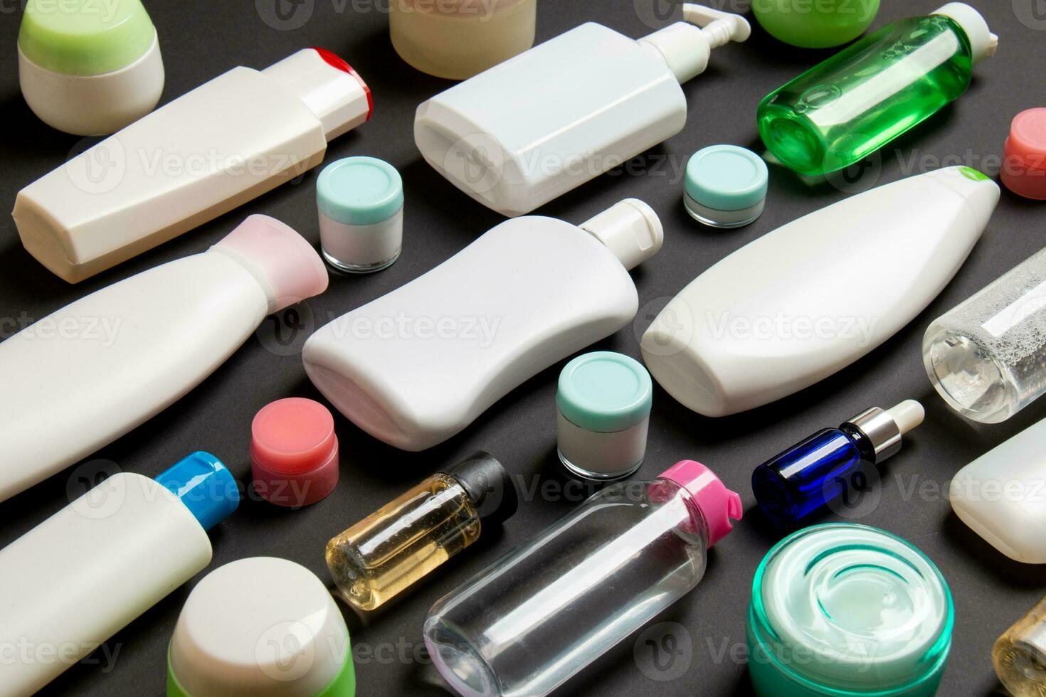 Group of plastic bodycare bottle Flat lay composition with cosmetic products on colored background empty space for you design. Set of White Cosmetic containers, top view with copy space photo