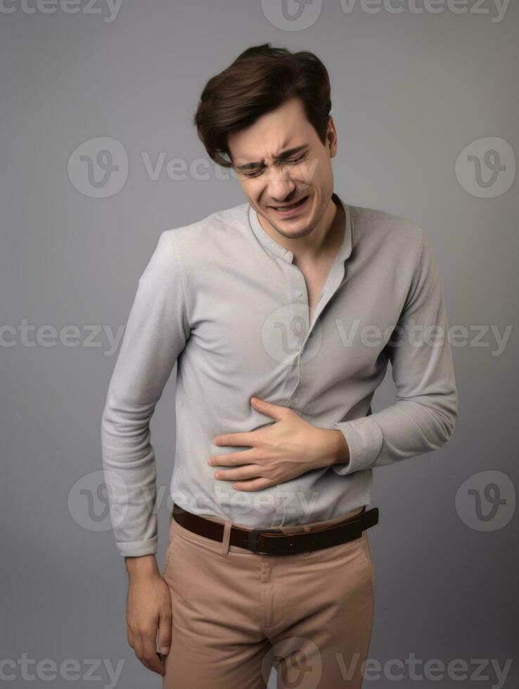 Man with stomachache on neutral background AI Generative photo