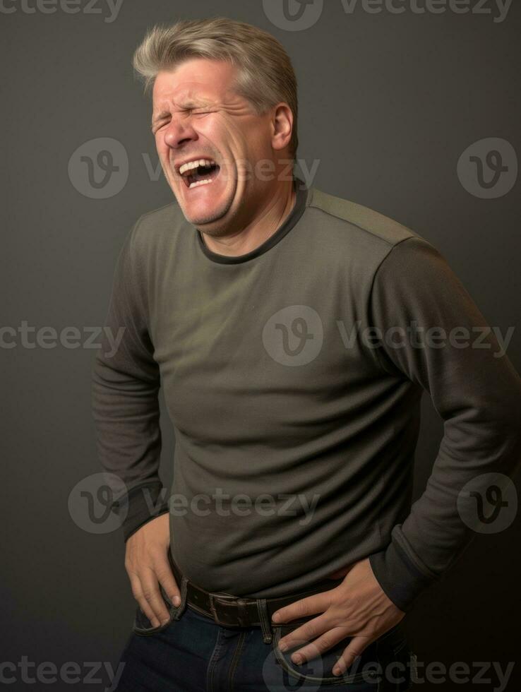 Man with stomachache on neutral background AI Generative photo