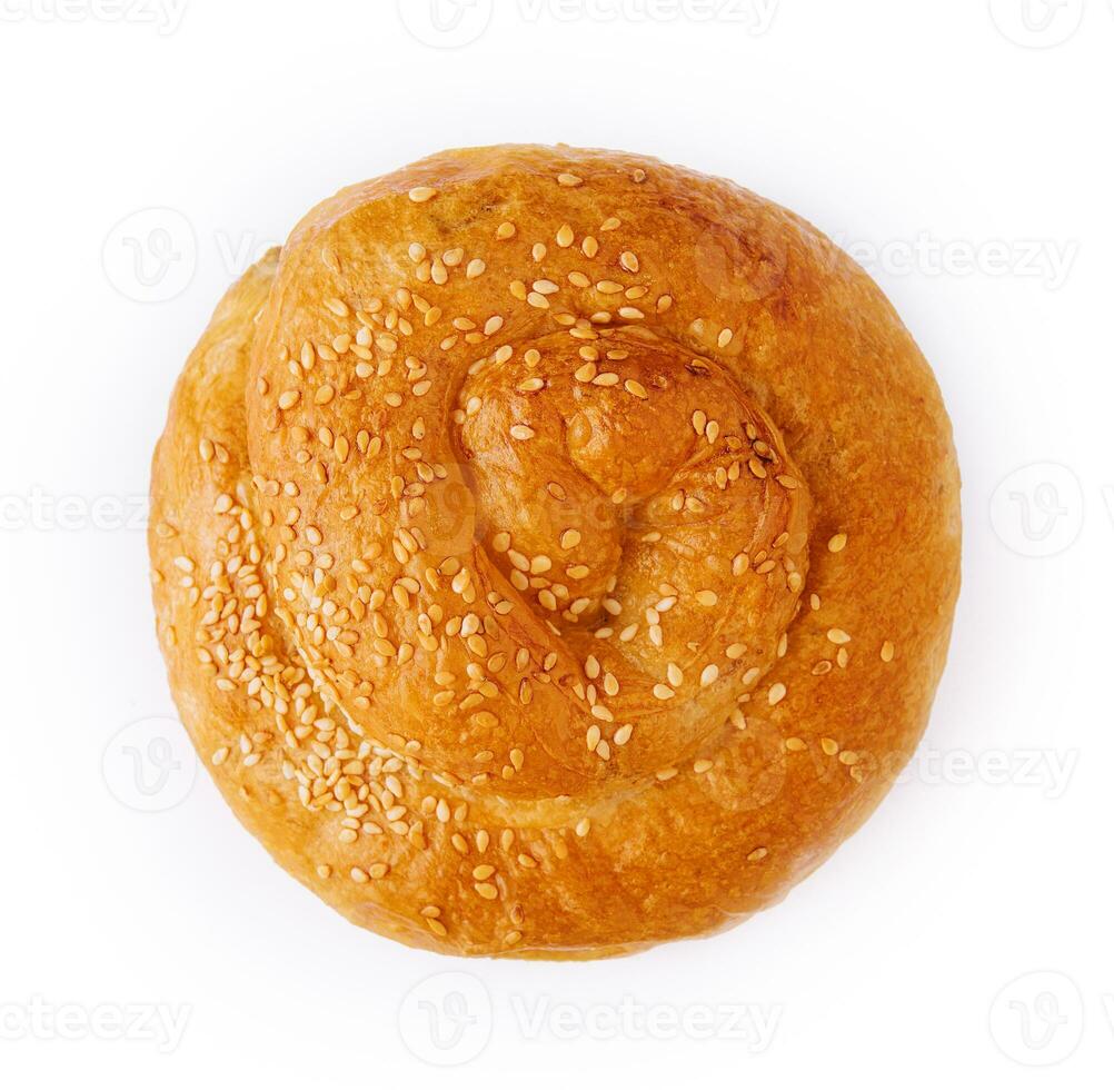 Fresh twisted bun with sesame seeds photo