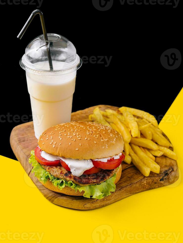 burger with french fries and milkshake photo