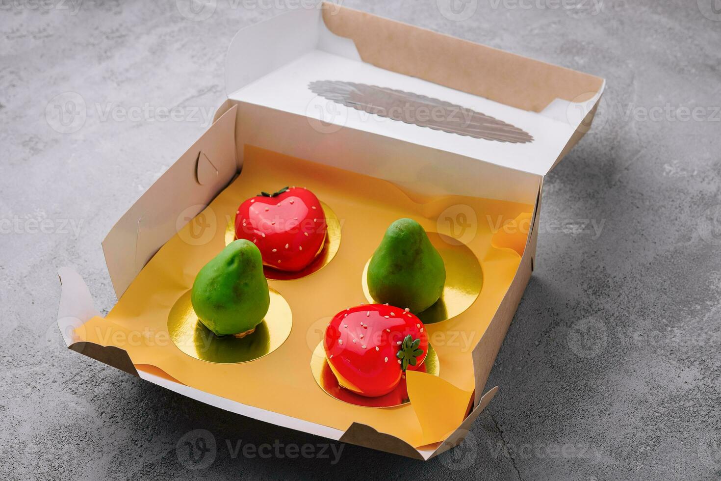 fruit-shaped mousse cakes in a box photo