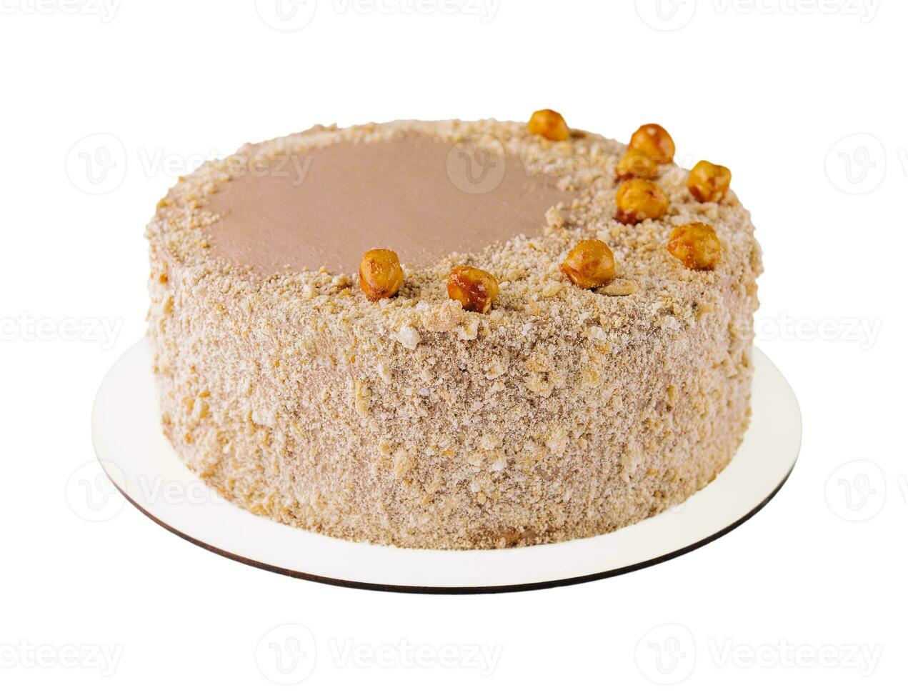 Kyiv cake with hazelnuts, chocolate glaze, and a buttercream-like filling photo